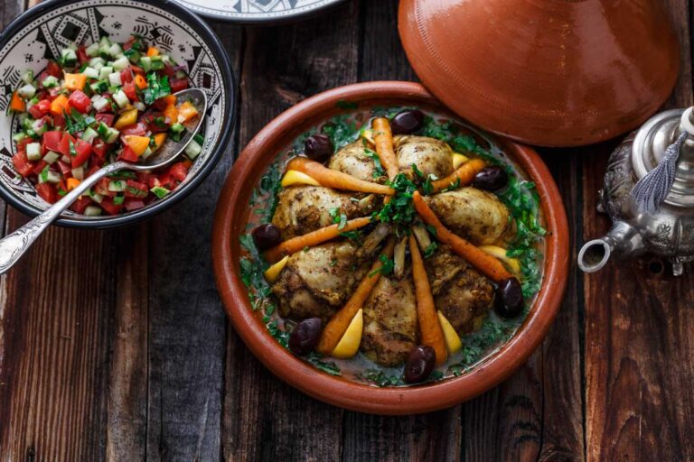 Traditional Moroccan Chicken Tajine with Vegetables and Raisins